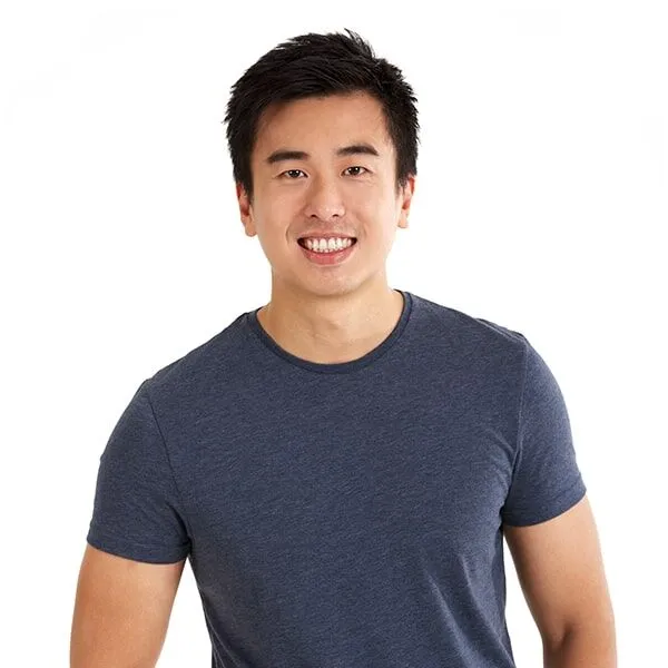 Young man smiling after laser dentistry